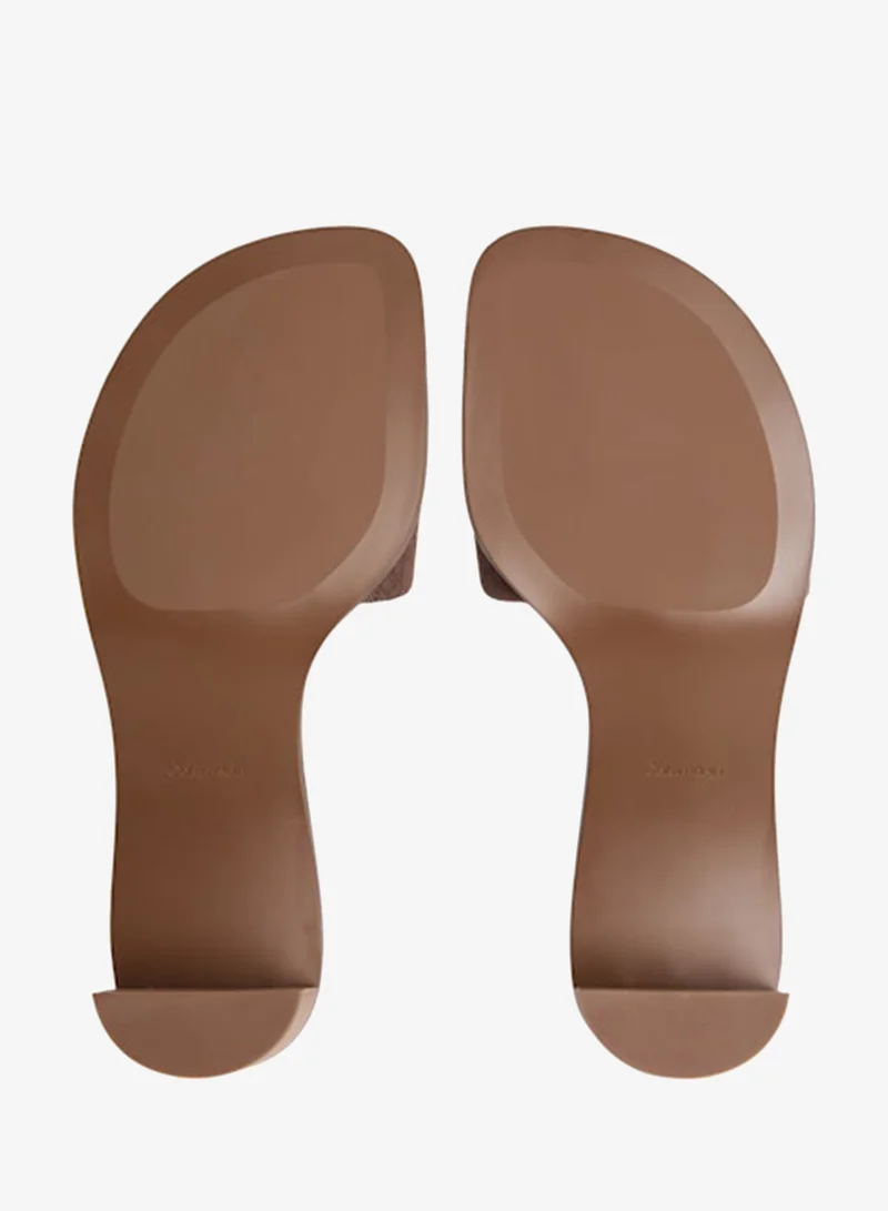 Calvin Klein Silver Mink All-Over CK Monogram Block Heel Mules for Women | Best Price UAE